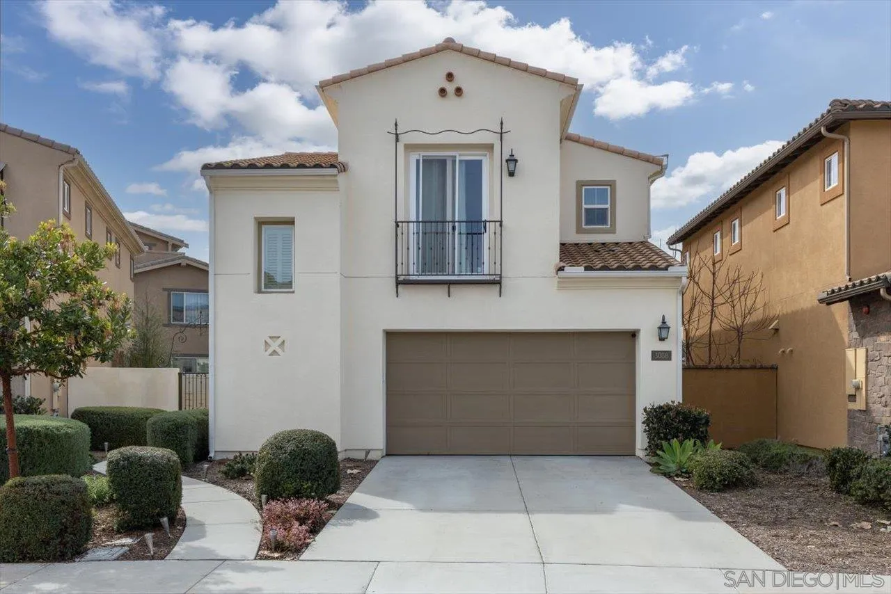 3008 Estero Road Carlsbad, CA 92010 - Photo 1 of 47 a front view of a house with garage