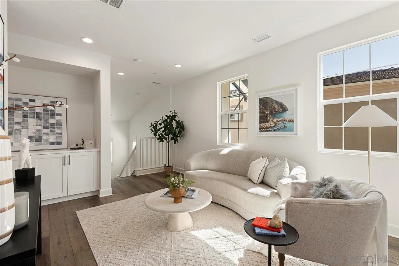 3008 Estero Road Carlsbad, CA 92010 - Photo 13 of 47 a living room with furniture and a potted plant
