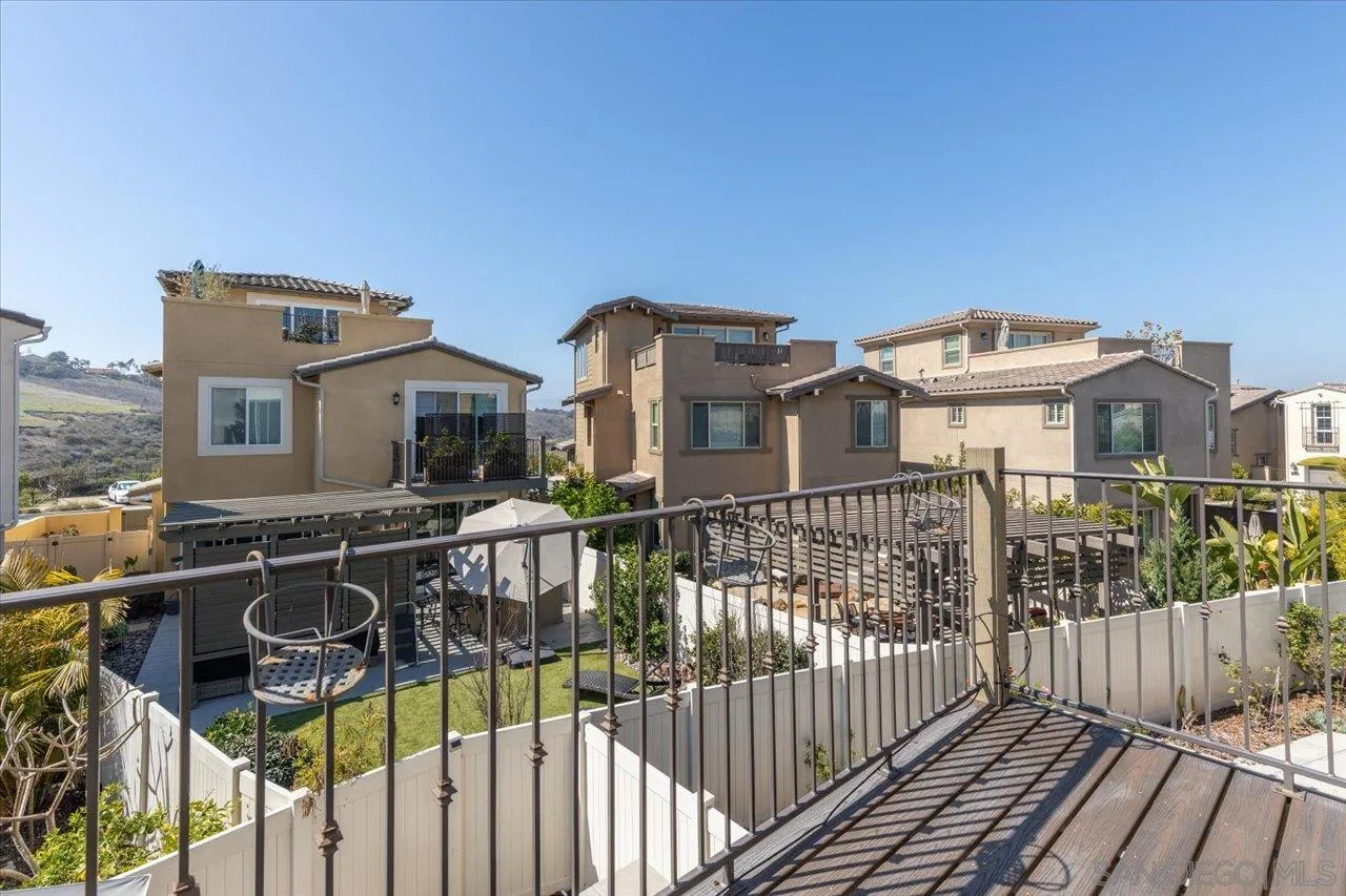 3008 Estero Road Carlsbad, CA 92010 - Photo 16 of 47 a view of a roof deck with table and chairs