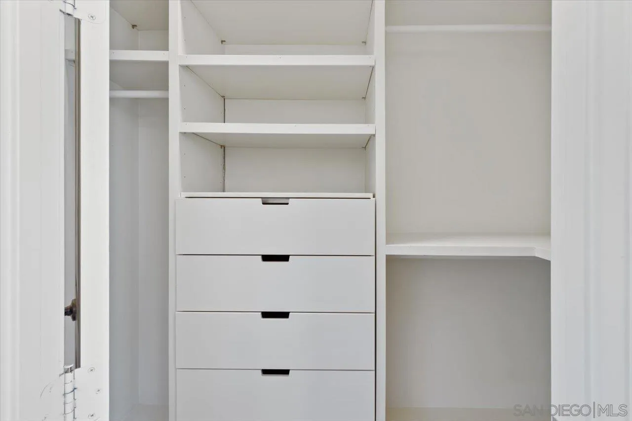 3008 Estero Road Carlsbad, CA 92010 - Photo 17 of 47 a view of walk in closet with empty racks