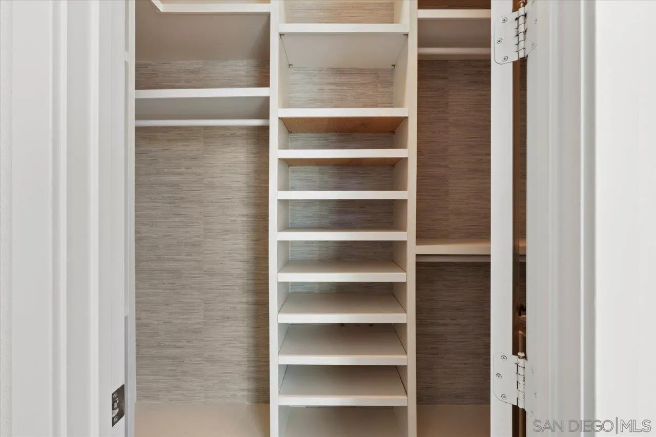 3008 Estero Road Carlsbad, CA 92010 - Photo 18 of 47 a view of walk in closet with empty racks