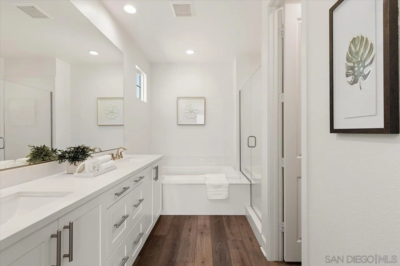 3008 Estero Road Carlsbad, CA 92010 - Photo 19 of 47 a bathroom with a sink a toilet and vanity