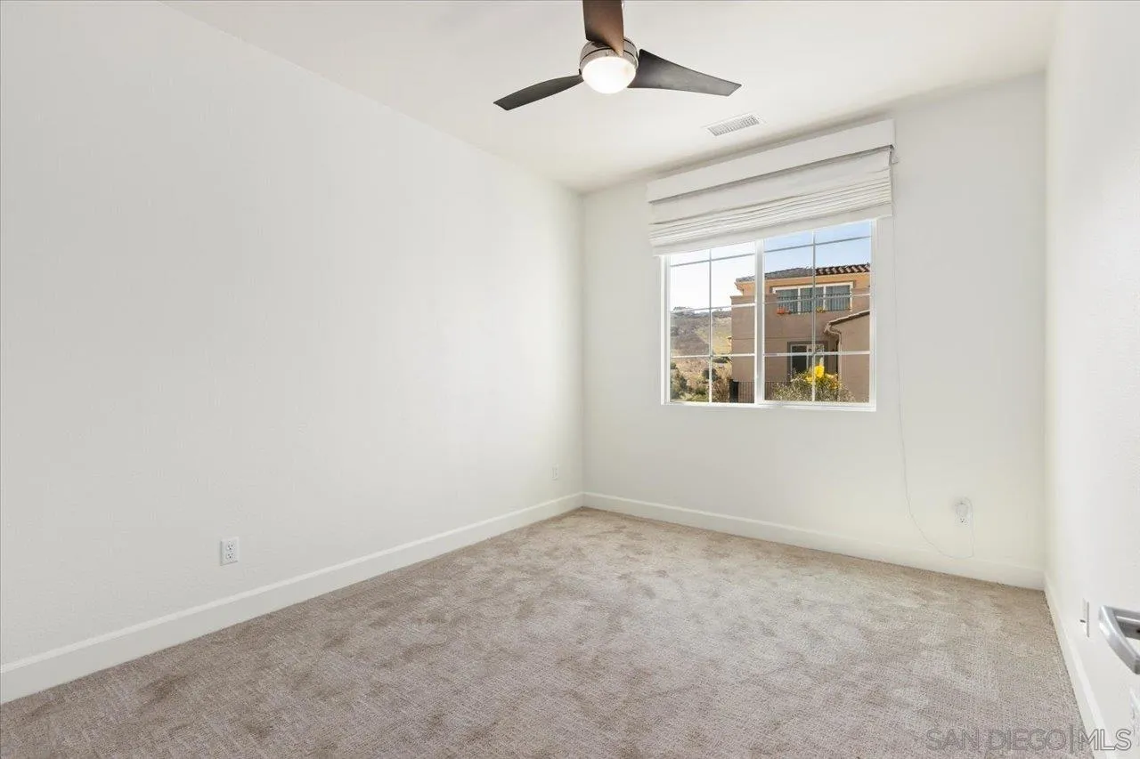 3008 Estero Road Carlsbad, CA 92010 - Photo 20 of 47 an empty room with a window