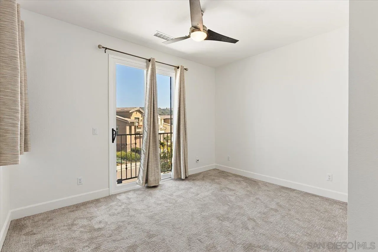 3008 Estero Road Carlsbad, CA 92010 - Photo 23 of 47 an empty room with windows and closet