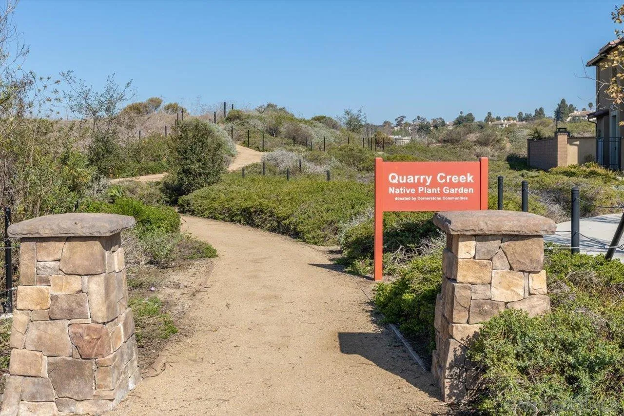 3008 Estero Road Carlsbad, CA 92010 - Photo 34 of 47 a sign that is sitting in front of a building
