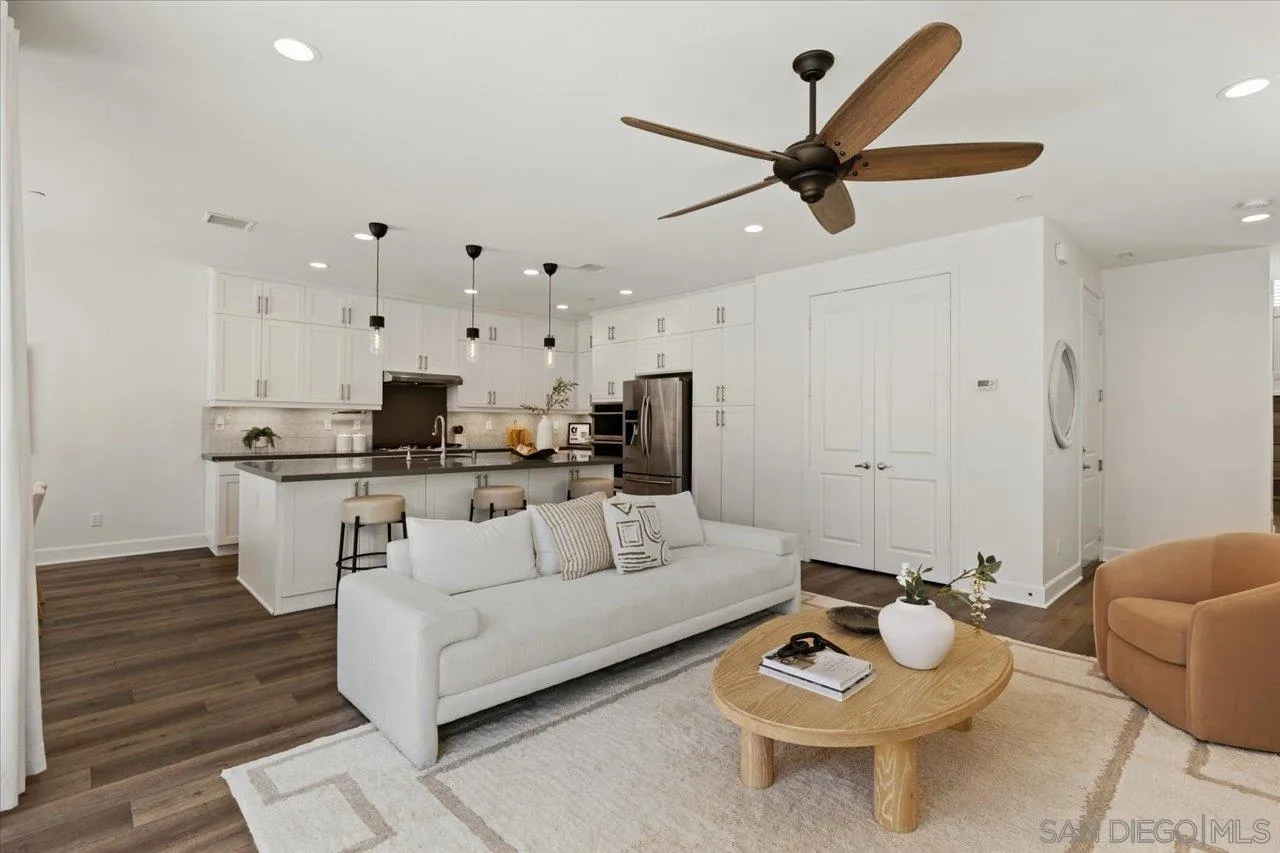 3008 Estero Road Carlsbad, CA 92010 - Photo 4 of 47 a living room with furniture and a wooden floor