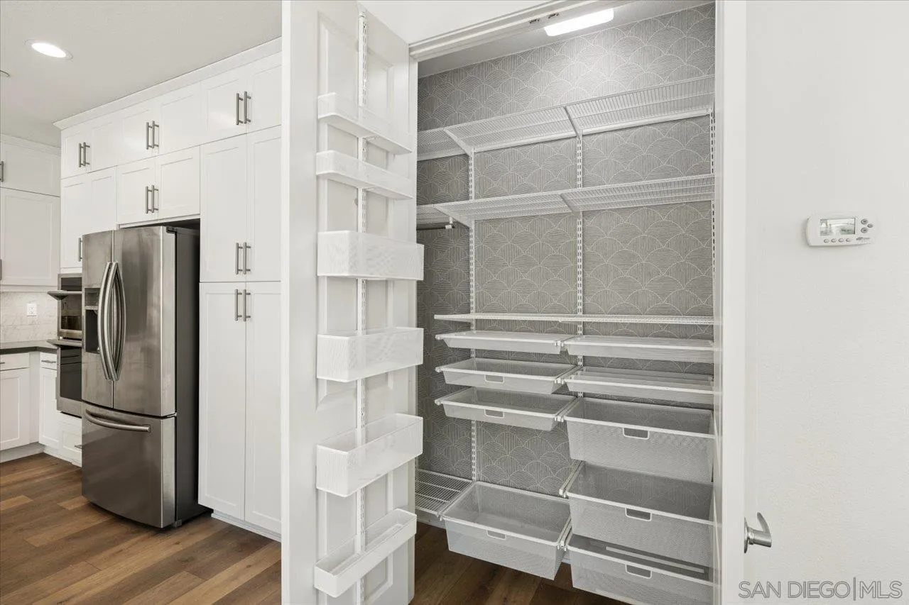 3008 Estero Road Carlsbad, CA 92010 - Photo 10 of 47 a view of walk in closet with empty racks