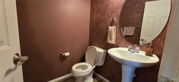 a bathroom with a sink and a toilet