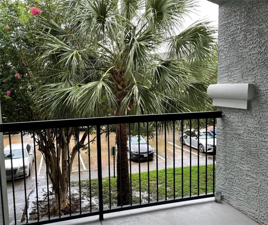 a view of a balcony with a plant