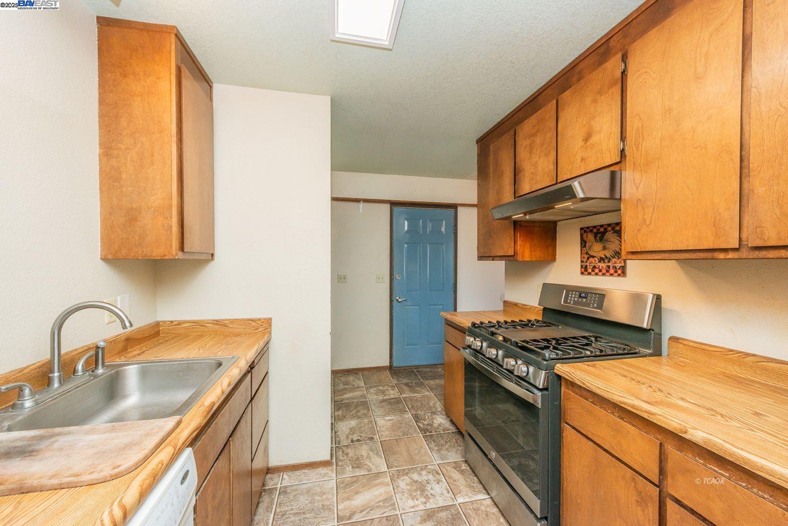 10 2nd Avenue Lewiston, CA 96052 - Photo 16 of 38 a kitchen that has a sink and a stove