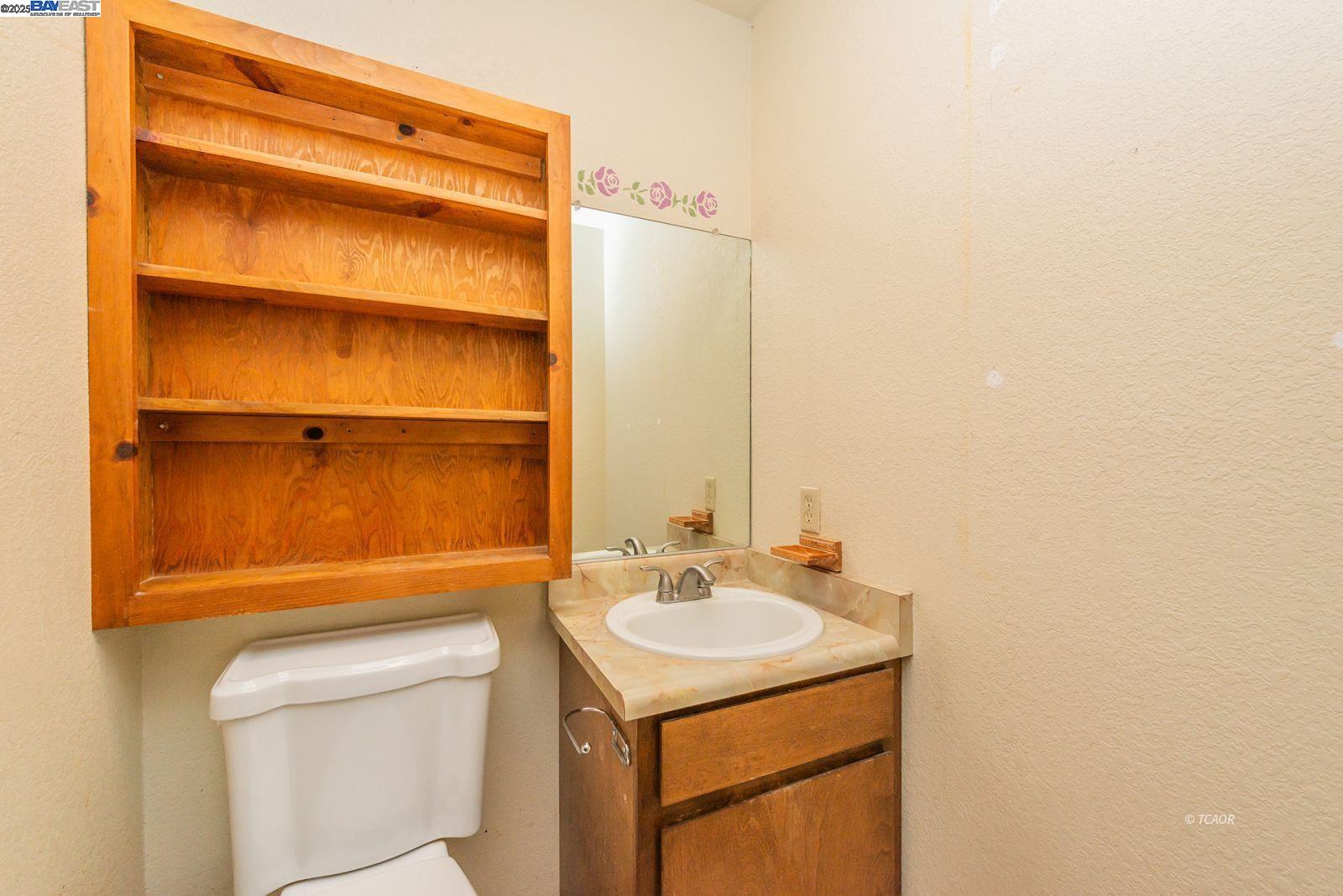 10 2nd Avenue Lewiston, CA 96052 - Photo 24 of 38 a bathroom with a sink toilet and vanity