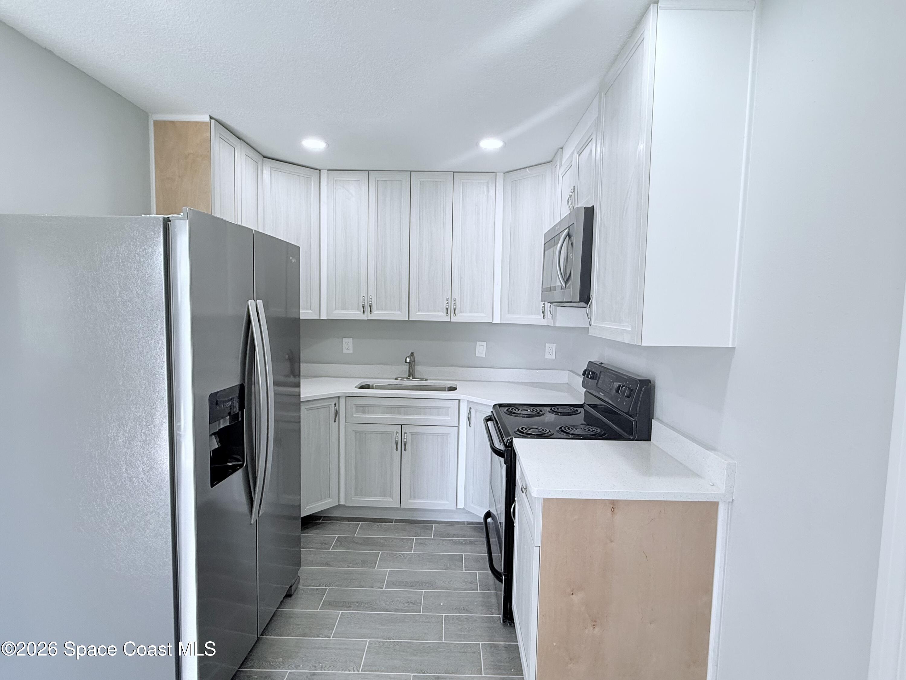 2556 Sarno Road Melbourne, FL 32935 - Photo 2 of 23 IMG_3390 - Copy