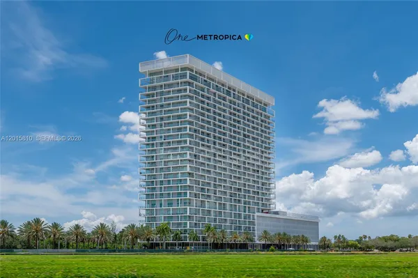 a front view of a building with garden