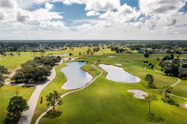 a view of a swimming pool with an ocean view