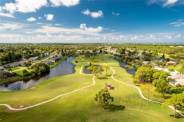a view of a lake with a city