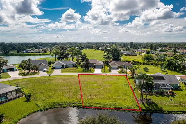 a view of a swimming pool with a lake