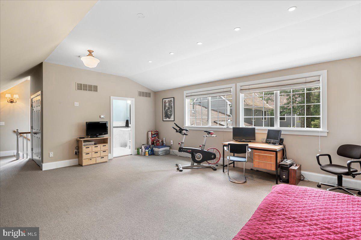1873 Stuart Road West Princeton, NJ 08540 - Photo 23 of 46 a living room with furniture and a flat screen tv