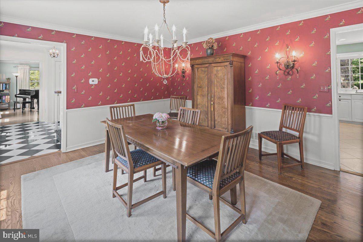 1873 Stuart Road West Princeton, NJ 08540 - Photo 10 of 46 a view of a dining room with furniture and wooden floor