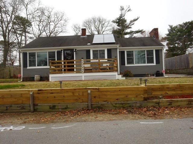 15 Cranberry Road Sagamore, MA 02561 - Photo 1 of 42 a front view of house with yard outdoor seating and barbeque oven