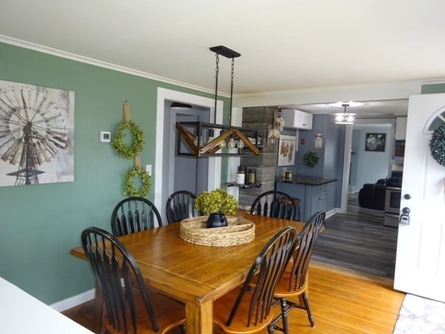 15 Cranberry Road Sagamore, MA 02561 - Photo 11 of 42 a view of a dining room with furniture window and wooden floor