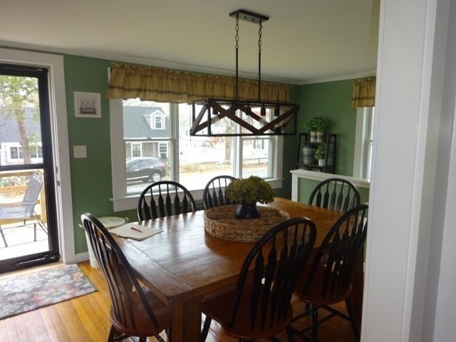 15 Cranberry Road Sagamore, MA 02561 - Photo 12 of 42 a view of a dining room with furniture window and wooden floor