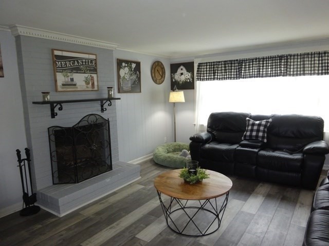 15 Cranberry Road Sagamore, MA 02561 - Photo 15 of 42 a living room with furniture and a wooden floor