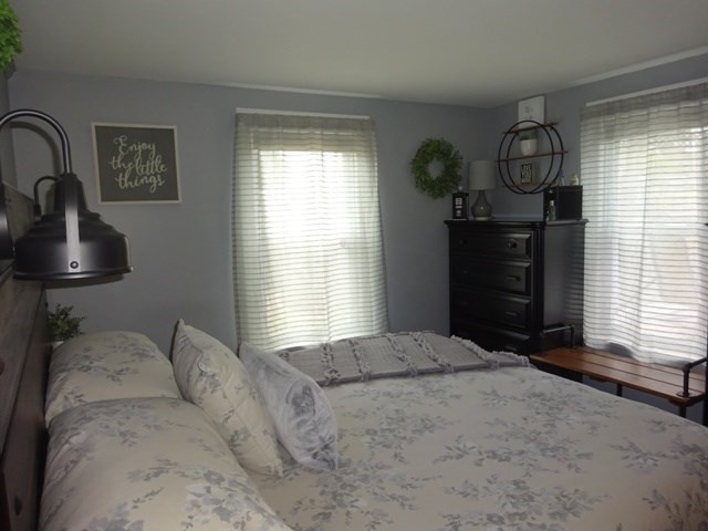 15 Cranberry Road Sagamore, MA 02561 - Photo 17 of 42 a bedroom with a bed and a window