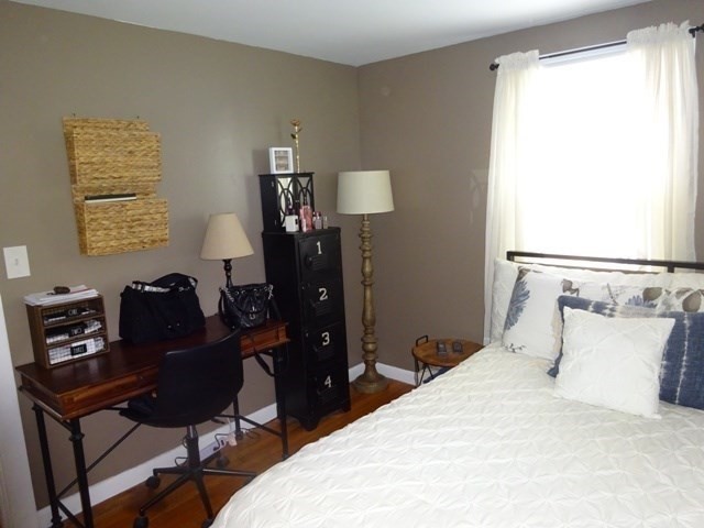 15 Cranberry Road Sagamore, MA 02561 - Photo 22 of 42 a bedroom with a bed and a window
