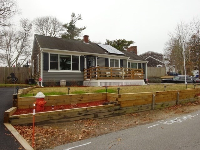 15 Cranberry Road Sagamore, MA 02561 - Photo 5 of 42 a front view of a house with swimming pool