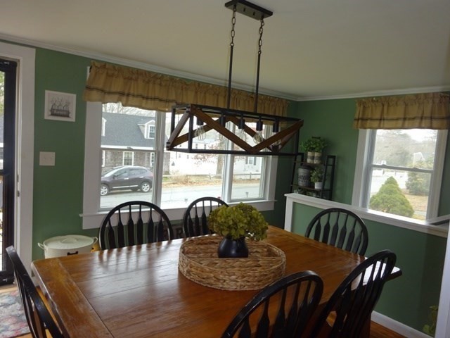 15 Cranberry Road Sagamore, MA 02561 - Photo 10 of 42 a view of a dining room with furniture window and outside view