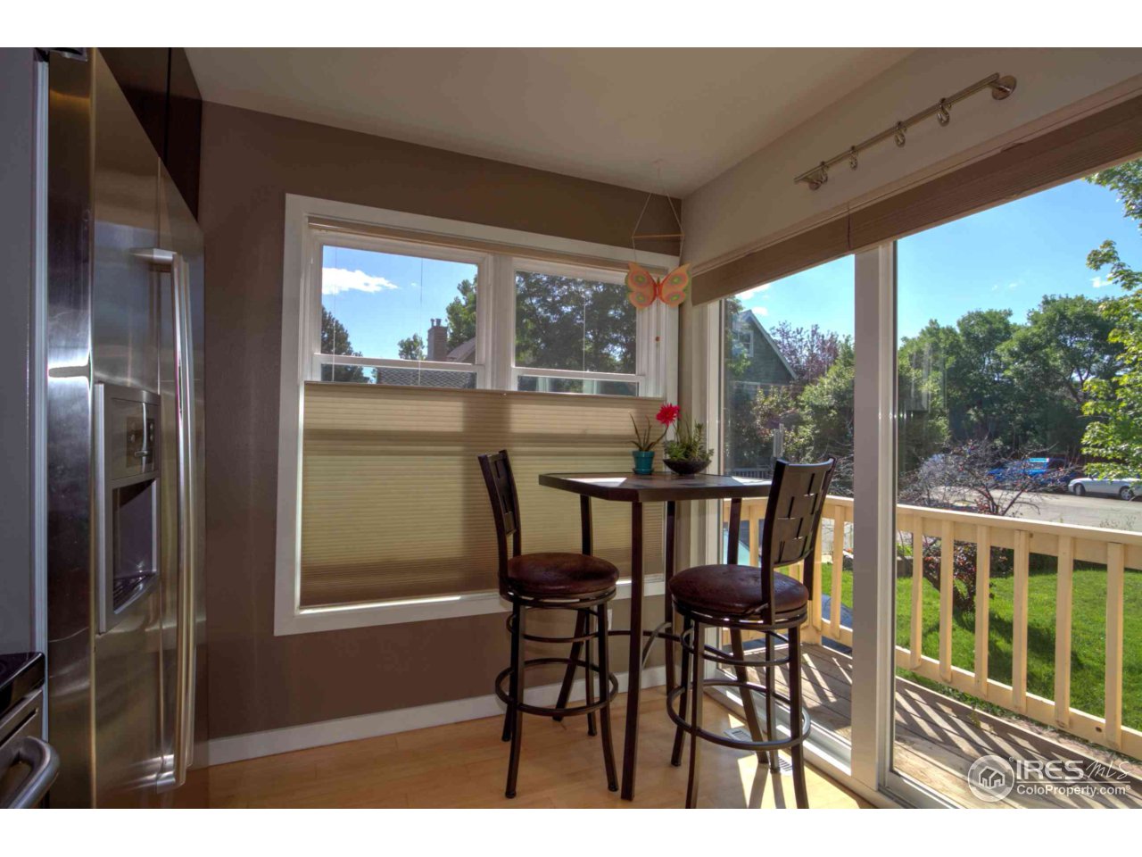 4115 Riverside Avenue Boulder, CO 80304 - Photo 4 of 24 a view of a dining room with furniture window and outside view