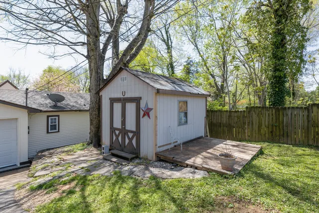 a backyard of a house with lots of green space