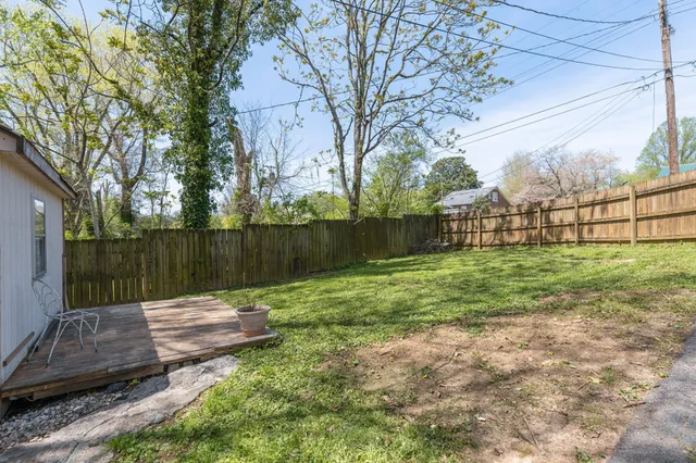 a backyard of a house with lots of green space