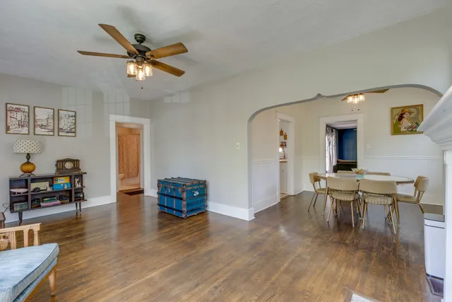 a view of a livingroom with furniture and a chair
