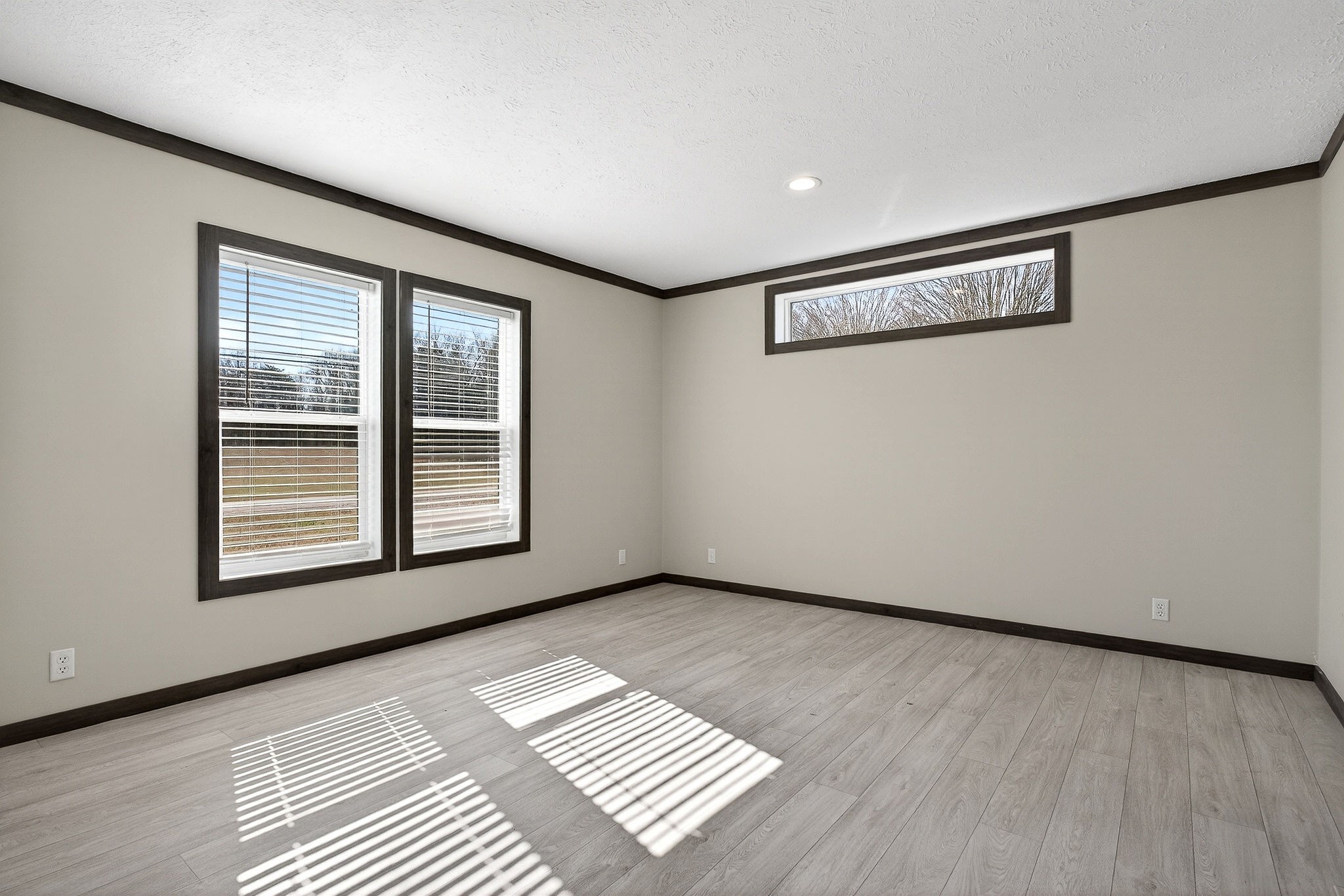 3881 Shellsford Road McMinnville, TN 37110 - Photo 31 of 44 a view of an empty room with a window and wooden floor