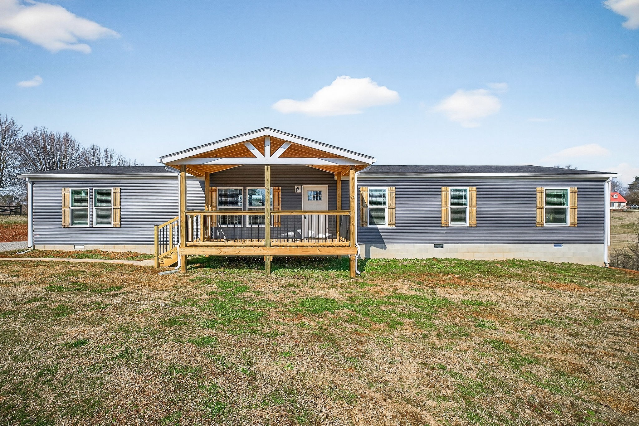 3881 Shellsford Road McMinnville, TN 37110 - Photo 5 of 44 a view of a house with a backyard