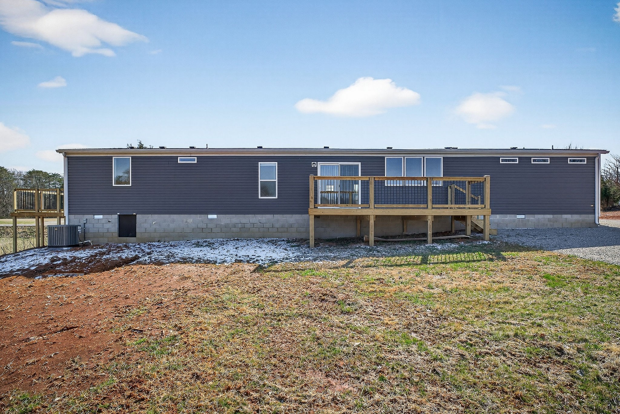 3881 Shellsford Road McMinnville, TN 37110 - Photo 6 of 44 a view of a terrace with a chair and iron fence