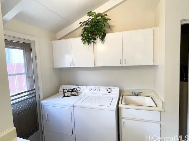 a utility room with dryer and washer