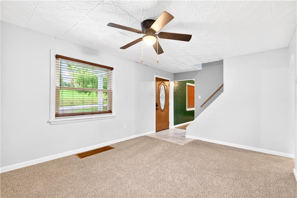 124 Bunker Hill Road Aliquippa, PA 15001 - Photo 14 of 37 a view of an empty room with a window