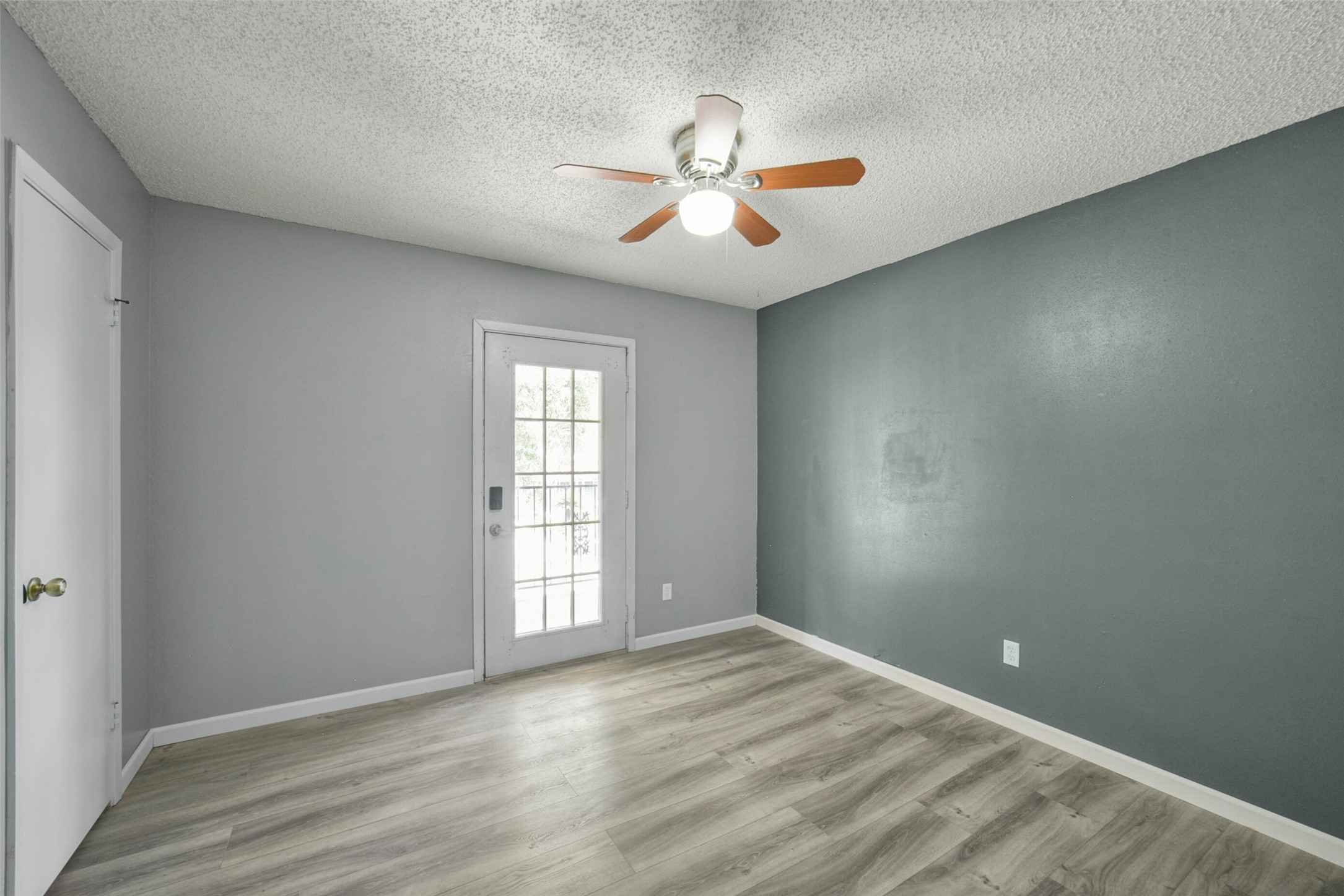 18606 Mellowgrove Lane Spring, TX 77379 - Photo 26 of 43 Another secondary bedroom with access to the front balcony