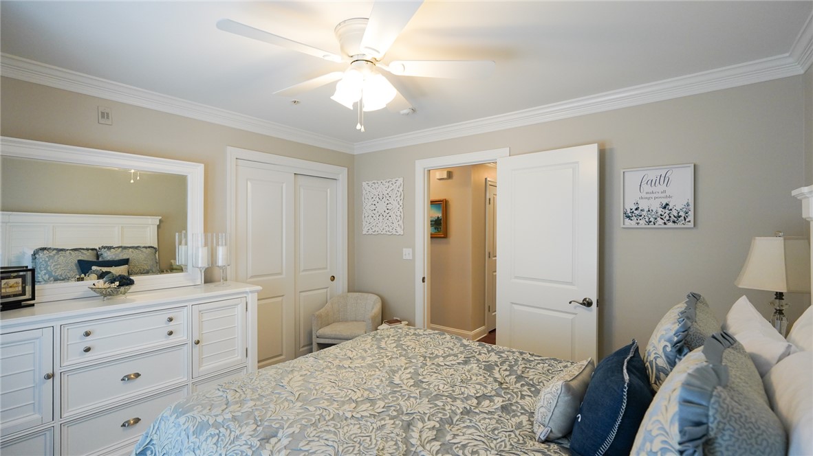 303 Lookover Drive Anderson, SC 29621 - Photo 24 of 46 This restful bedroom features elegant crown molding and a convenient ceiling fan for comfort.