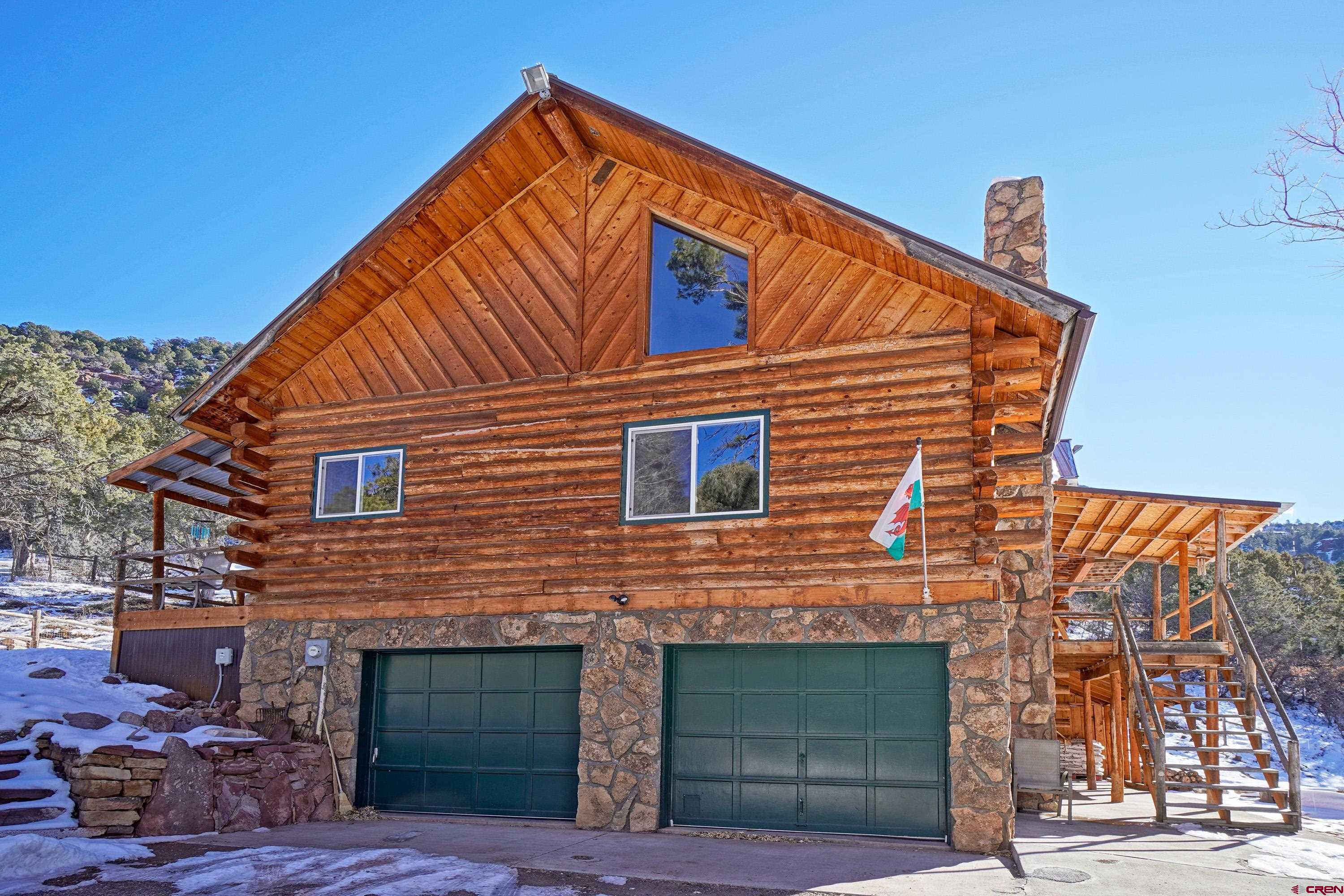 448 Whitehouse Vista Lane Ridgway, CO 81432 - Photo 6 of 34 a view of a house with a street