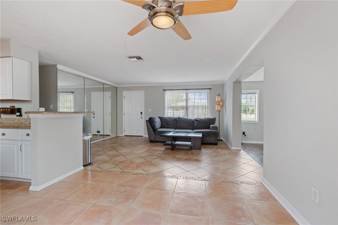3018 Sunset Road Fort Myers, FL 33901 - Photo 7 of 28 a living room with furniture and a window