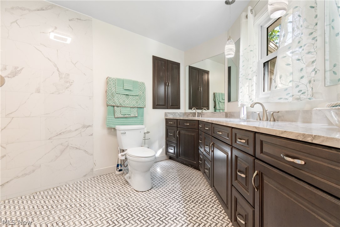 3255 Old Weymouth Road Medina, OH 44256 - Photo 18 of 31 Bathroom with tile flooring, oversized vanity, and toilet