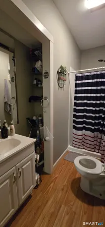 a bathroom with a sink and a toilet