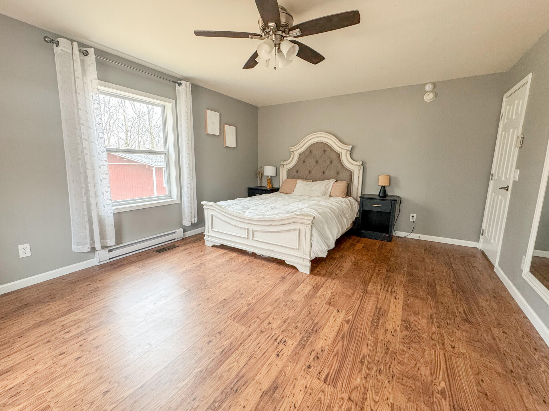 2236 Eagle Path Bushkill, PA 18324 - Photo 12 of 30 a bedroom with a bed and a window