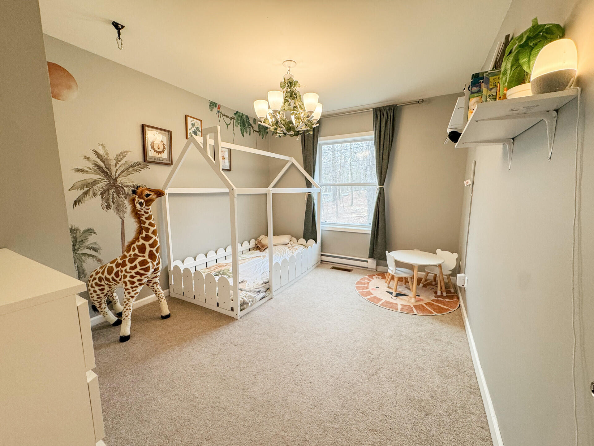 2236 Eagle Path Bushkill, PA 18324 - Photo 17 of 30 a view of a bedroom with a chandelier