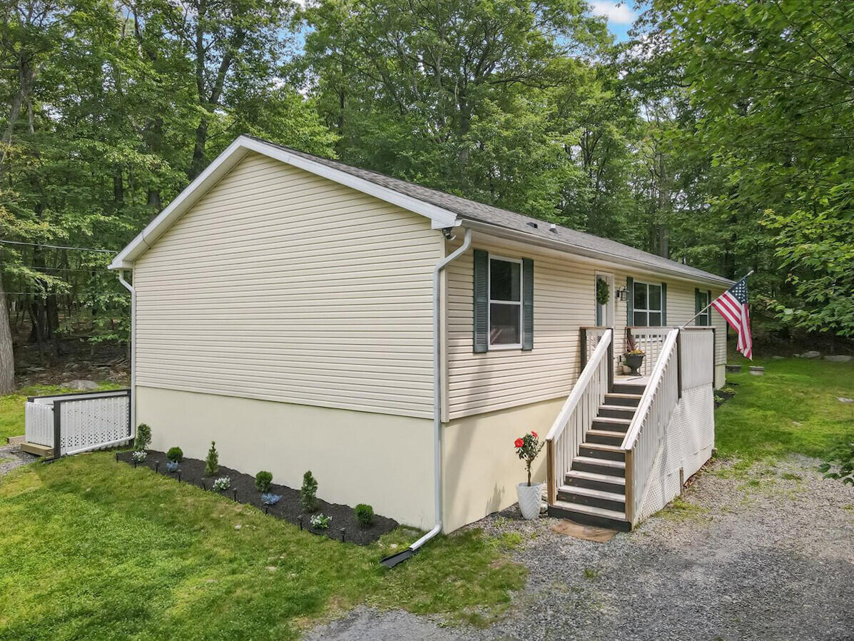 2236 Eagle Path Bushkill, PA 18324 - Photo 24 of 30 a view of a house with backyard
