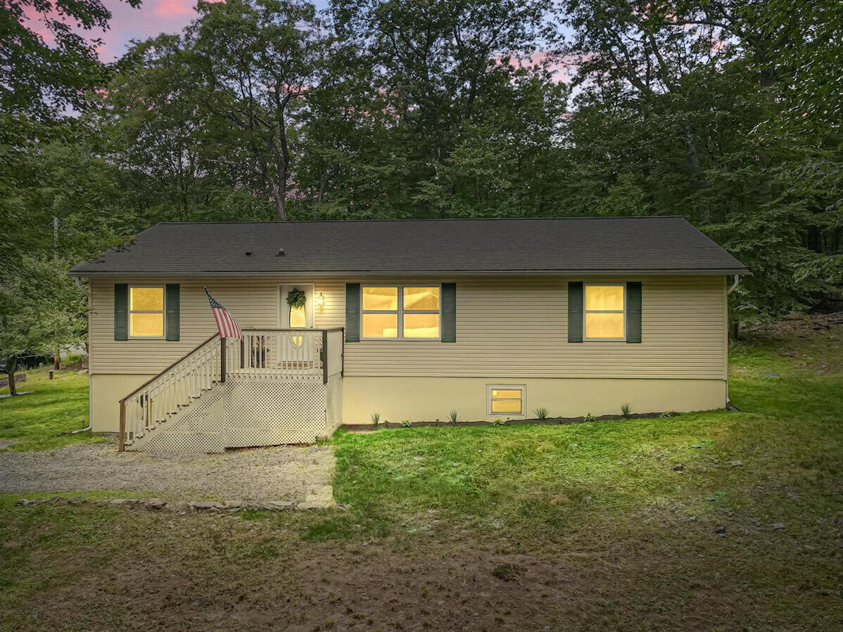 2236 Eagle Path Bushkill, PA 18324 - Photo 3 of 30 a front view of a house with a yard
