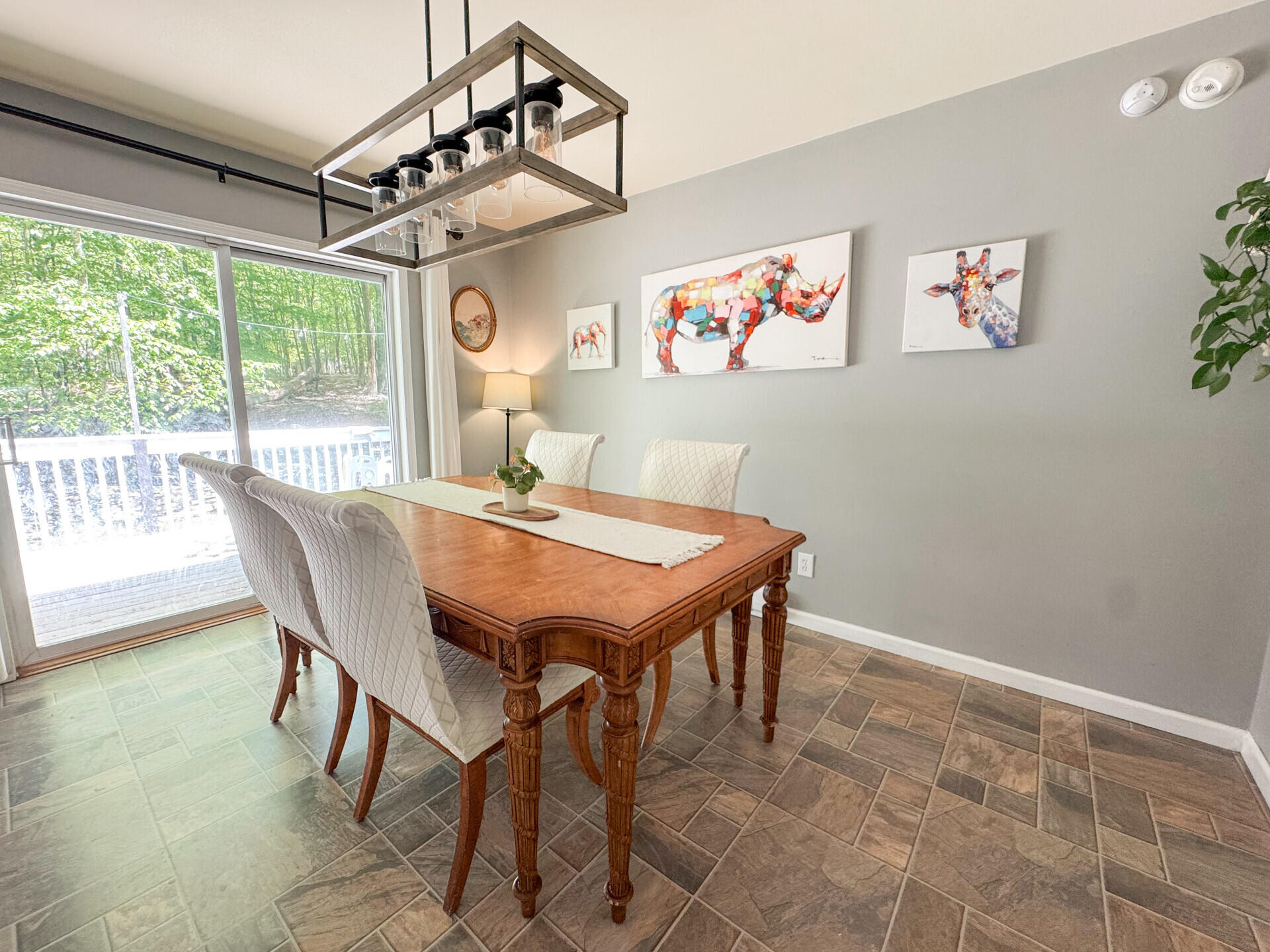 2236 Eagle Path Bushkill, PA 18324 - Photo 8 of 30 a dining room with a wooden table and chairs
